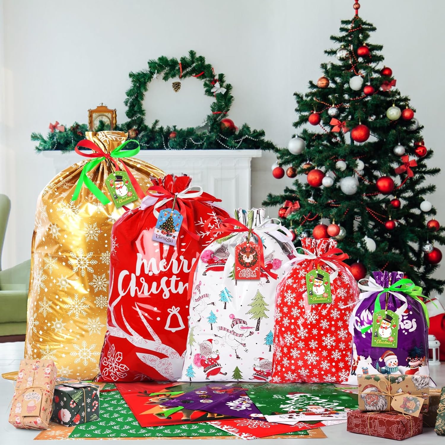 16pcs Christmas Drawstring Gift Bags with 16 Tags – 5 Sizes Reusable Xmas Wrapping Bags, Large Medium Small Holiday Gift Goody Bags for Party Decorations & Presents